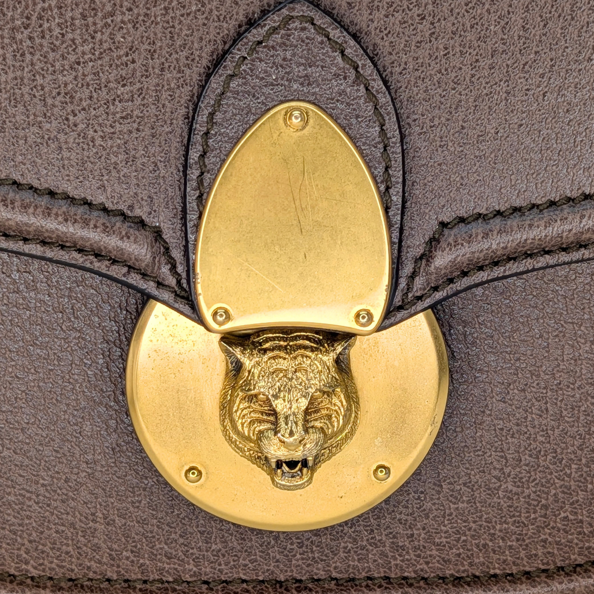 Gucci textured Animalier leather Saddle Crossbody Bag Brown