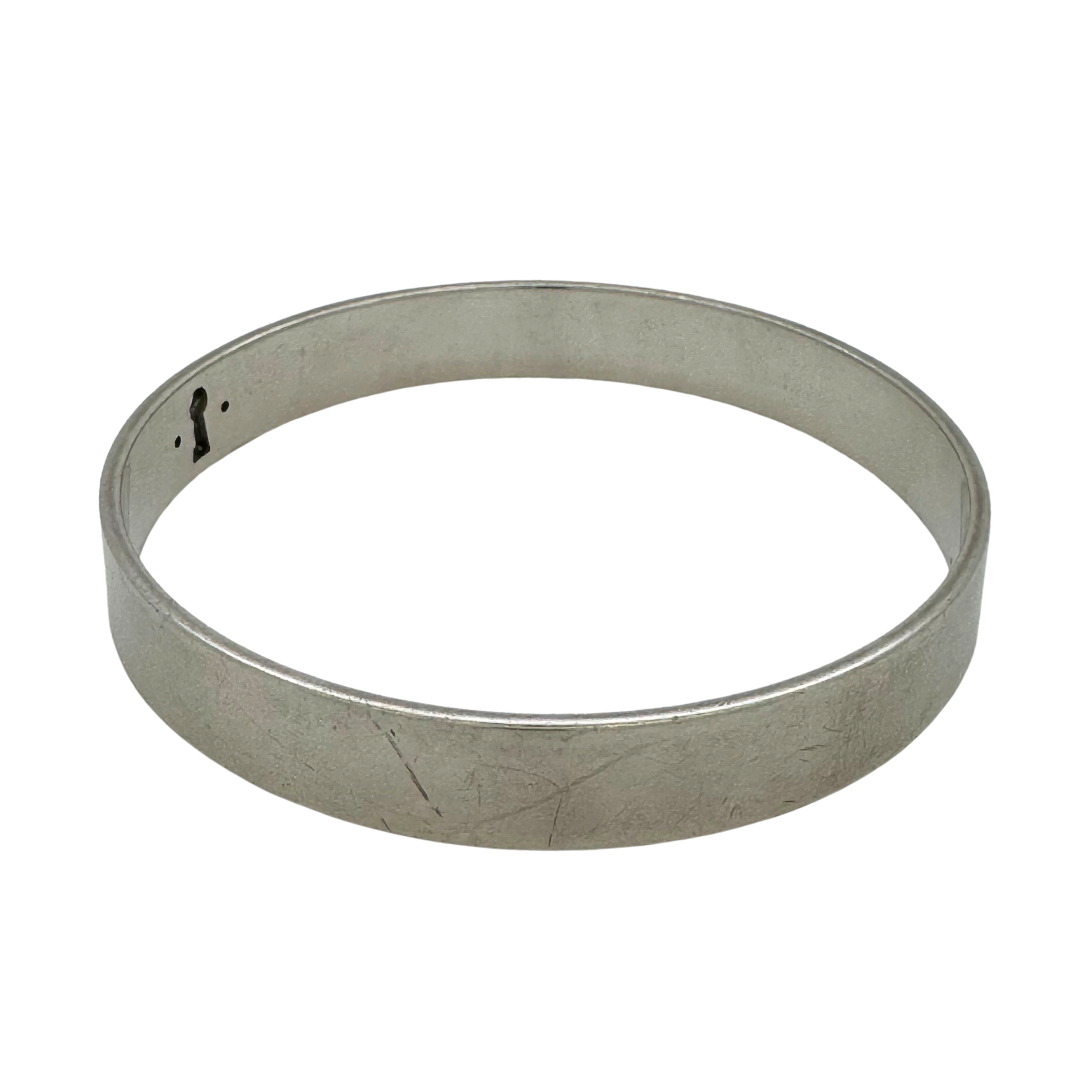 Tiffany & Co Diamond Lock Narrow Bangle Silver .04 TDW - Lost Designer